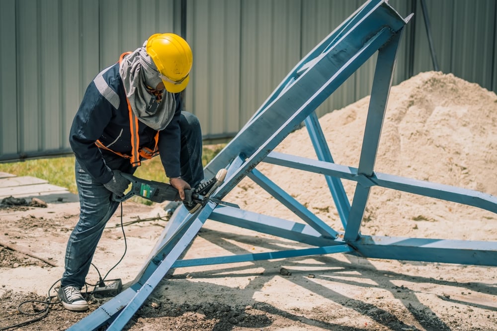 Worker,To,Cutting,Steel,In,Construction,Site,With,Reciprocating,Saw